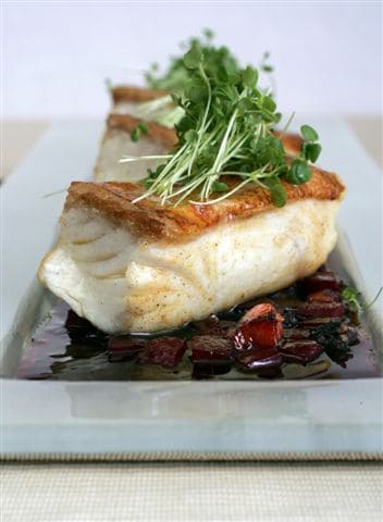 Image of Roast Halibut, With Beetroot, Bacon And Black Pudding Dressing And Horseradish Cream, Chefs Pencil