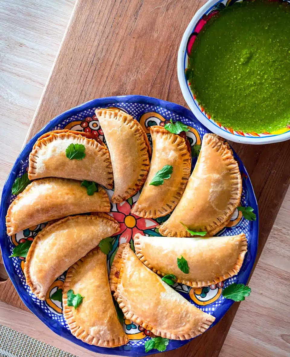 Oxtail Empanadas with side chimichurri sauce
