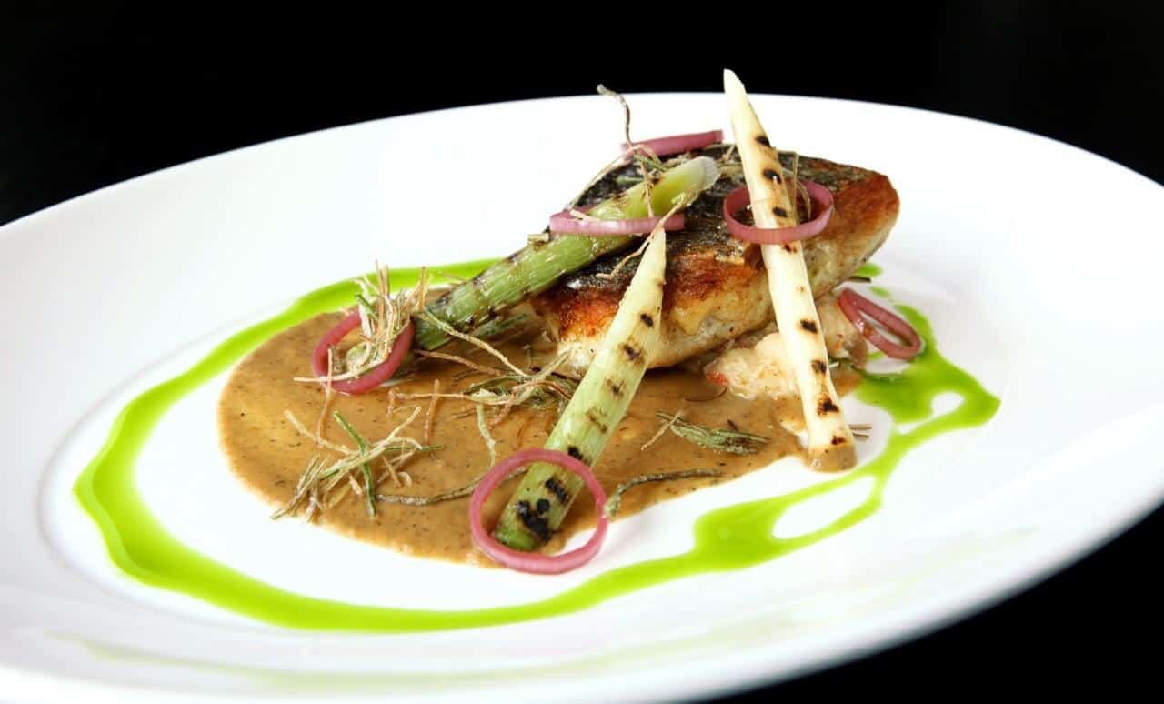 Pan Fried Stone Bass, Burnt Leek Puree, Charred Baby Leek, Crab, Pickled Shallots, Crispy Leeks, Chive Emulsion