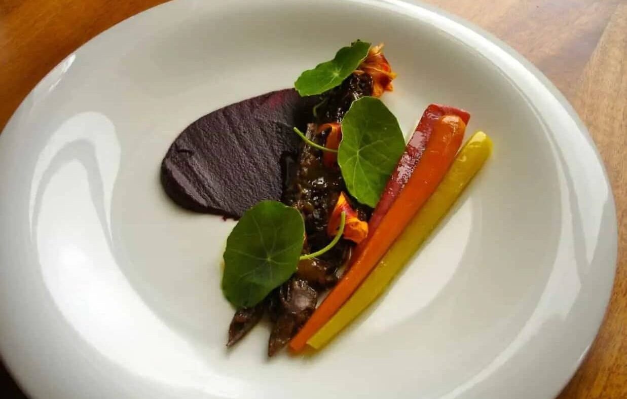 Wagyu Oxtail w/ Heirloom Carrots, Pickles & Nasturtium