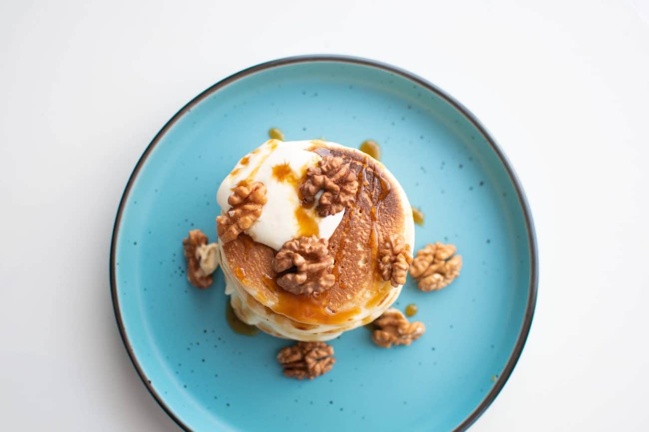 Pancakes with Brie Cream, Honey and Walnuts - Chef's Pencil